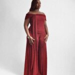 Woman wearing Hannifa, a red off-shoulder Bardot two-piece set with wide-leg trousers by XELENE.